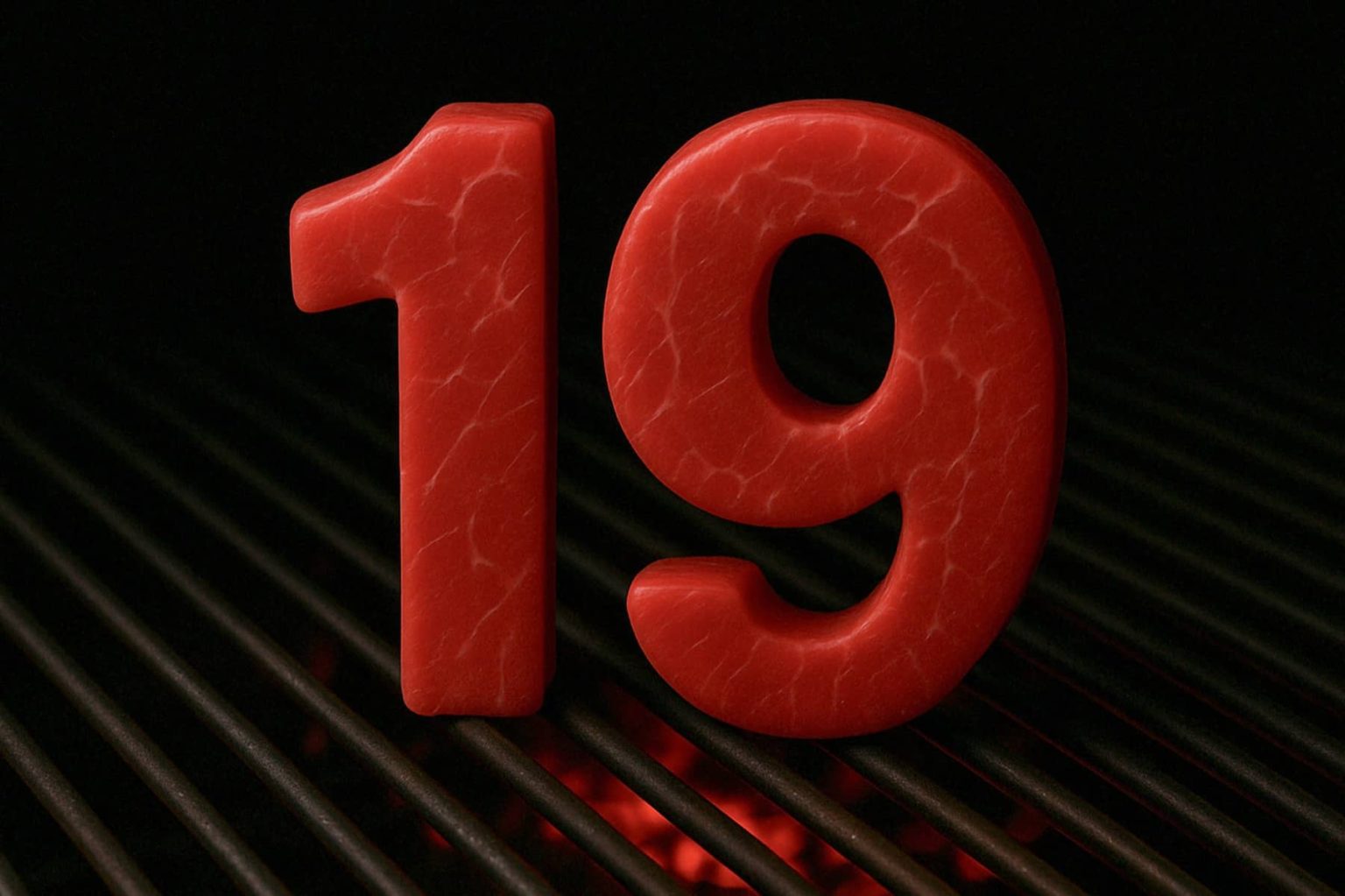 המספר 19, שנראה כמו בשר אדום נא, עומד על גריל עם סורגים שחורים וגחלים זוהרים מתחתיו, מה שמרמז שהוא מתבשל.